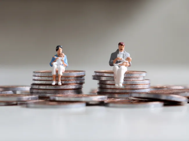 people sitting on coins